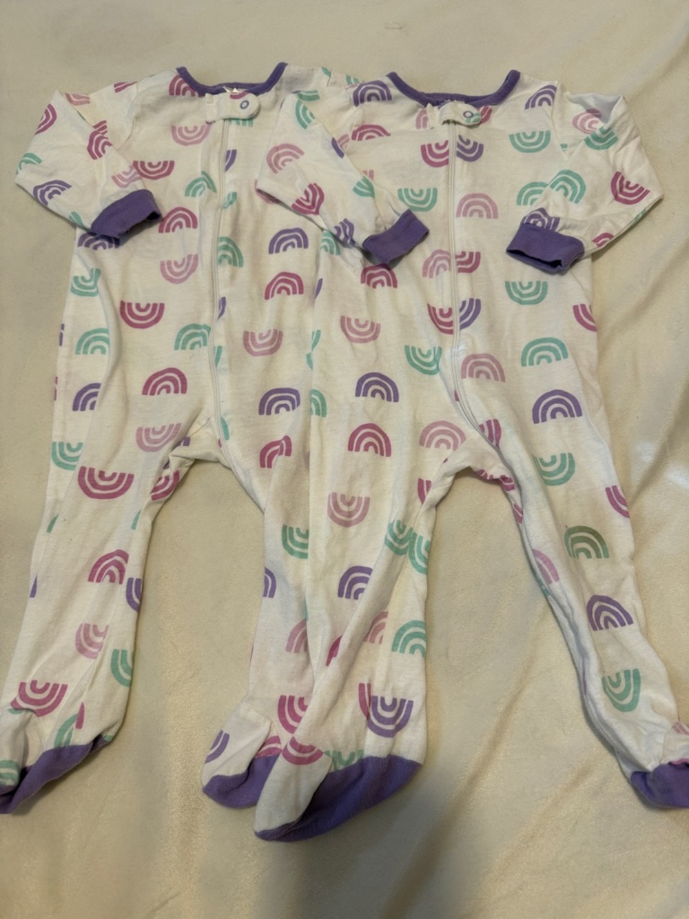 Baby Footed One-Piece Pajamas in White with Pastel Rainbows